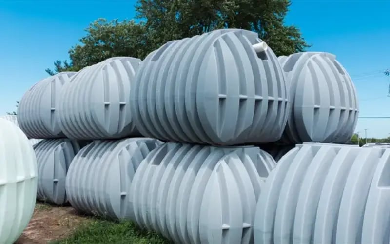 372-0638-miltiple-septic-tanks-stacked-on-yard-800x500-032026