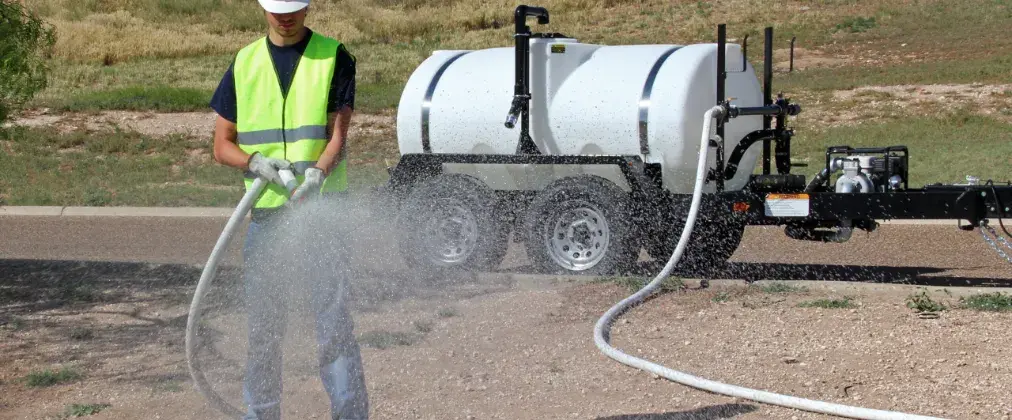 364-0631-worker-spraying-construction-site-1012x420-072026
