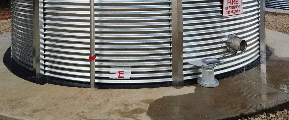 374-0520-corrugated-tank-leak-1011x422-102026