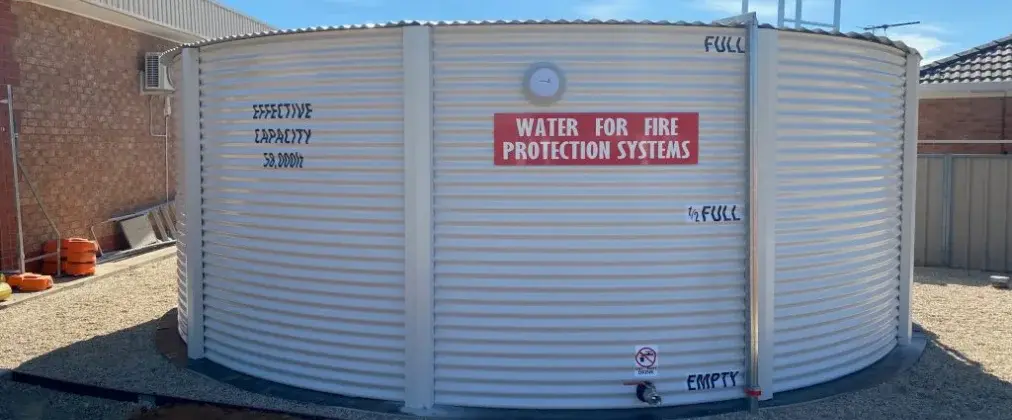374-0520-white-fire-protection-tank-corrugated-steel-1012x420-072026