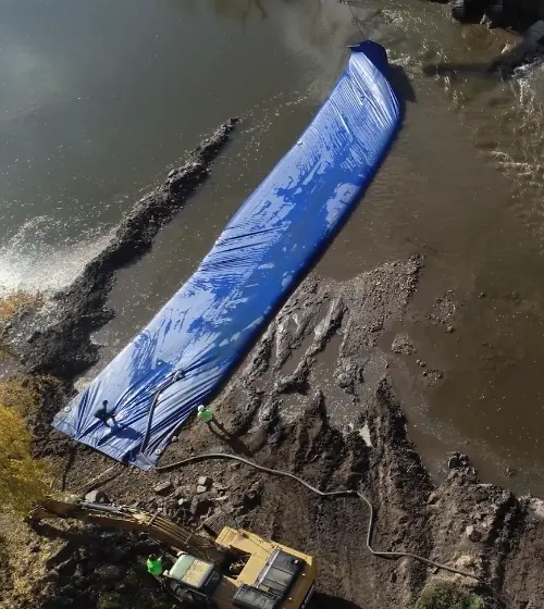 Inflate the cofferdam using available water source